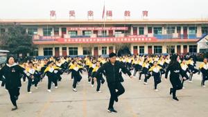 Zhang Pengfei is the principal of Xiguan Primary School in Linyi County in north China’s Shanxi Province.(Screengrab) Zhang Pengfei is the principal of Xiguan Primary School in Linyi County in north China’s Shanxi Province.(Screengrab)