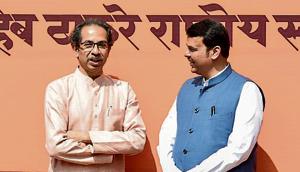 Sena chief Uddhav Thackeray (L) and CM Devendra Fadnavis at an event for the Bal Thackeray memorial, on Wednesday.(Kunal Patil/HT Photo) Sena chief Uddhav Thackeray (L) and CM Devendra Fadnavis at an event for the Bal Thackeray memorial, on Wednesday.(Kunal Patil/HT Photo)