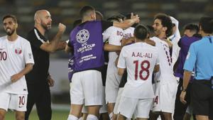 Qatar's head coach Felix Sanchez, second left, celebrates with players during the AFC Asian Cup quarter-final match against Korea Republic.(AP) Qatar's head coach Felix Sanchez, second left, celebrates with players during the AFC Asian Cup quarter-final match against Korea Republic.(AP)
