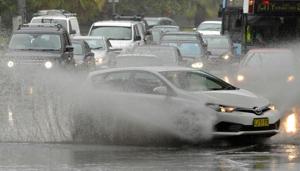 Communities were cut off, farmers stranded and cows washed offshore as heavy rain pelted northeast Australia Sunday, with one major river breaking 118-year-old floodwater records.(AFP) Communities were cut off, farmers stranded and cows washed offshore as heavy rain pelted northeast Australia Sunday, with one major river breaking 118-year-old floodwater records.(AFP)