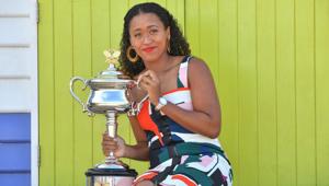 Japan's Naomi Osaka poses for photographs with the Australian Open trophy.(AFP) Japan's Naomi Osaka poses for photographs with the Australian Open trophy.(AFP)