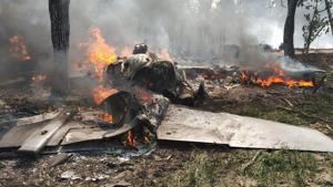 The pilot Rohit Katoch (36) ejected safely after steering his burning aircraft a few kilometres away from a rural residential area in Hatimpur locality.(HT PHOTO) The pilot Rohit Katoch (36) ejected safely after steering his burning aircraft a few kilometres away from a rural residential area in Hatimpur locality.(HT PHOTO)