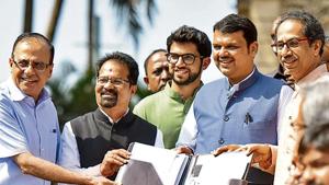 Maharashtra CM Devendra Fadnavis (second from right) with Shiv Sena chief Uddhav Thackery (right) and his son Aditya Thackeray (in green).(Kunal Patil/HT File) Maharashtra CM Devendra Fadnavis (second from right) with Shiv Sena chief Uddhav Thackery (right) and his son Aditya Thackeray (in green).(Kunal Patil/HT File)