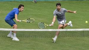 Italy's Marco Cecchinato and Simone Bolelli during a training session ahead of their Davis Cup match against India, in Kolkata.(AP) Italy's Marco Cecchinato and Simone Bolelli during a training session ahead of their Davis Cup match against India, in Kolkata.(AP)