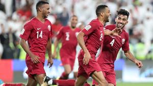 Qatar's Hamid Ismaeil celebrates scoring their fourth goal with team mates.(REUTERS) Qatar's Hamid Ismaeil celebrates scoring their fourth goal with team mates.(REUTERS)