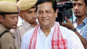Assam Chief Minister Sarbananda Sonowal has ordered an inquiry after a video went viral showing police removing the jacket of a small boy who was attending his programme (File Photo)(PTI) Assam Chief Minister Sarbananda Sonowal has ordered an inquiry after a video went viral showing police removing the jacket of a small boy who was attending his programme (File Photo)(PTI)
