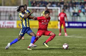 File image: Players of Real Kashmir FC (in yellow jersey) and Churchill Brothers FC in action during their I-League match.(PTI) File image: Players of Real Kashmir FC (in yellow jersey) and Churchill Brothers FC in action during their I-League match.(PTI)