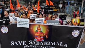 Devotees and members of Hindu Jagran Manch (HJM) participate in a march 'Walk for Ayyappa' in relation to violence faced by devotees at Sabarimala's Ayyappa temple in Kolkata.(PTI) Devotees and members of Hindu Jagran Manch (HJM) participate in a march 'Walk for Ayyappa' in relation to violence faced by devotees at Sabarimala's Ayyappa temple in Kolkata.(PTI)