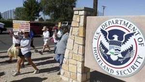 This June 2018 photo shows protesters walking along Montana Avenue outside the El Paso Processing Center, in El Paso, Texas. Federal immigration officials are said to be force feeding some of the immigrants who have been on hunger strike for nearly a month inside the Texas detention facility.(AP) This June 2018 photo shows protesters walking along Montana Avenue outside the El Paso Processing Center, in El Paso, Texas. Federal immigration officials are said to be force feeding some of the immigrants who have been on hunger strike for nearly a month inside the Texas detention facility.(AP)