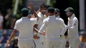 Australia's Mitchell Starc (centre) is congratulated by teammates after taking 5 wickets against Sri Lanka.(AP) Australia's Mitchell Starc (centre) is congratulated by teammates after taking 5 wickets against Sri Lanka.(AP)