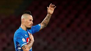 Napoli's Marek Hamsik reacts as he walks off the pitch after being substituted against Sampdoria on Saturday.(REUTERS) Napoli's Marek Hamsik reacts as he walks off the pitch after being substituted against Sampdoria on Saturday.(REUTERS)