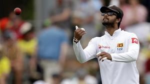 Sri Lanka's Dinesh Chandimal passes the ball to his bowler during their cricket test match against Australia in Canberra, Friday, Feb. 1, 2019(AP) Sri Lanka's Dinesh Chandimal passes the ball to his bowler during their cricket test match against Australia in Canberra, Friday, Feb. 1, 2019(AP)