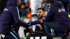 The injury appeared to happen when Lionel Messi was hit in the leg by Valencia defender Antonio Lato while they challenged for a ball in the second half on Saturday.(REUTERS) The injury appeared to happen when Lionel Messi was hit in the leg by Valencia defender Antonio Lato while they challenged for a ball in the second half on Saturday.(REUTERS)