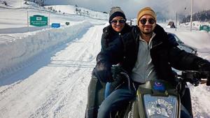 A couple enjoys snow-biking in Gulmarg. It took frequent spells of snow in January this year to bring large number of foreign tourists to Kashmir amid militancy.(HT Photo) A couple enjoys snow-biking in Gulmarg. It took frequent spells of snow in January this year to bring large number of foreign tourists to Kashmir amid militancy.(HT Photo)