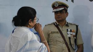 Rajeev Kumar, Kolkata Police Commissioner, with West Bengal chief minister Mamata Banerjee during West Bengal and Kolkata Police award ceremony beside the dharna stage at Esplanade in Kolkata on Monday.(Arijit Sen/HT Photo) Rajeev Kumar, Kolkata Police Commissioner, with West Bengal chief minister Mamata Banerjee during West Bengal and Kolkata Police award ceremony beside the dharna stage at Esplanade in Kolkata on Monday.(Arijit Sen/HT Photo)
