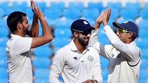 Vidarbha captain Faiz Fazal (C) along with players Aditya Sarwate (L) and Ganesh Satish celebrate against Saurashtra.(PTI) Vidarbha captain Faiz Fazal (C) along with players Aditya Sarwate (L) and Ganesh Satish celebrate against Saurashtra.(PTI)