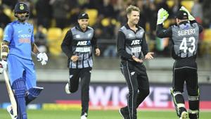 Shikhar Dhawan, left, walks, out for 21 bowled by a celebrating New Zealand's Lockie Fergusson.(AP) Shikhar Dhawan, left, walks, out for 21 bowled by a celebrating New Zealand's Lockie Fergusson.(AP)