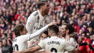 Real Madrid's Gareth Bale, right, celebrates with team mates after scoring his side's third goal.(AP) Real Madrid's Gareth Bale, right, celebrates with team mates after scoring his side's third goal.(AP)