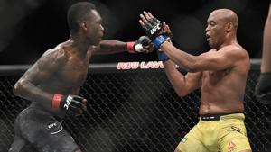 Nigeria's Israel Adesanya, left, and Brazil's Anderson Silva fight during their middleweight bout at the UFC 234.(AP) Nigeria's Israel Adesanya, left, and Brazil's Anderson Silva fight during their middleweight bout at the UFC 234.(AP)
