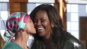 Alicia Keys, left, kisses Michelle Obama at the 61st annual Grammy Awards on Sunday.(Matt Sayles/Invision/AP) Alicia Keys, left, kisses Michelle Obama at the 61st annual Grammy Awards on Sunday.(Matt Sayles/Invision/AP)