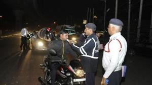 Traffic police personnel in the national capital say they are frequently threatened, sometimes assaulted or even mowed down by motorists when they attempt to prosecute drunk driving.(HT File) Traffic police personnel in the national capital say they are frequently threatened, sometimes assaulted or even mowed down by motorists when they attempt to prosecute drunk driving.(HT File)
