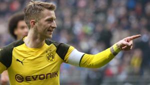Dortmund's German forward Marco Reus celebrates scoring during the German First division Bundesliga football match between Eintracht Frankfurt v BVB Borussia Dortmund(AFP) Dortmund's German forward Marco Reus celebrates scoring during the German First division Bundesliga football match between Eintracht Frankfurt v BVB Borussia Dortmund(AFP)