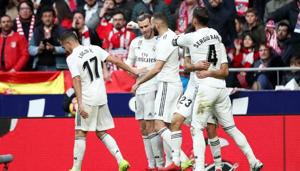 Real Madrid's Gareth Bale celebrates scoring their third goal with team mates(REUTERS) Real Madrid's Gareth Bale celebrates scoring their third goal with team mates(REUTERS)