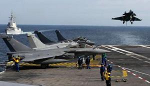 A French Rafale fighter jet Rafale lands on the ‘Charles de Gaulle A French Rafale fighter jet Rafale lands on the ‘Charles de Gaulle