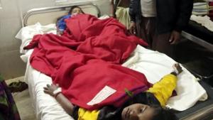 Young victims of food poisoning being treated at Sadar hospital after in Lohardaga, India, on Sunday(HT Photo) Young victims of food poisoning being treated at Sadar hospital after in Lohardaga, India, on Sunday(HT Photo)
