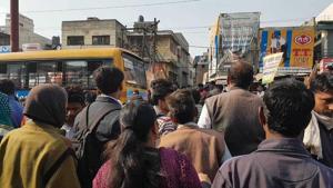 Locals gathered at the spot where an unidentified woman was mowed down by a private school bus in Greater Noida’s Dadri area.(HT Photo) Locals gathered at the spot where an unidentified woman was mowed down by a private school bus in Greater Noida’s Dadri area.(HT Photo)