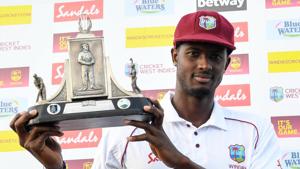 Jason Holder of West Indies holds the Wisden trophy at the end of day 4 of the 3rd and final Test between West Indies and England at Darren Sammy Cricket Ground.(AFP) Jason Holder of West Indies holds the Wisden trophy at the end of day 4 of the 3rd and final Test between West Indies and England at Darren Sammy Cricket Ground.(AFP)