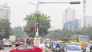 The smart traffic signals light installed at Kanhai Chowk near Huda City Centre metro station, in Gurugram is one of the four junctions in the city that automatically turns green if anticipated volume of traffic is high.(Parveen Kumar / HT Photo) The smart traffic signals light installed at Kanhai Chowk near Huda City Centre metro station, in Gurugram is one of the four junctions in the city that automatically turns green if anticipated volume of traffic is high.(Parveen Kumar / HT Photo)