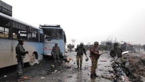 Indian soldiers examine the debris after an explosion in Lethpora in south Kashmir's Pulwama district on Thursday. (ANI/REUTERS Photo)(ANI) Indian soldiers examine the debris after an explosion in Lethpora in south Kashmir's Pulwama district on Thursday. (ANI/REUTERS Photo)(ANI)