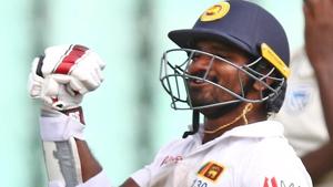 Kusal Perera celebrates the victory after hitting the winning runs during the fourth day of the first Test against South Africa.(AFP) Kusal Perera celebrates the victory after hitting the winning runs during the fourth day of the first Test against South Africa.(AFP)