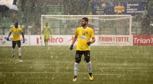 Real Kashmir's Danish Farooq looks on amid snowfall during their I-League club football match against Gokulam Kerala FC.(AFP) Real Kashmir's Danish Farooq looks on amid snowfall during their I-League club football match against Gokulam Kerala FC.(AFP)