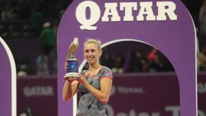 Elise Mertens poses with the trophy after her victory over Romanian Simona Halep.(AFP) Elise Mertens poses with the trophy after her victory over Romanian Simona Halep.(AFP)