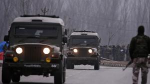 Security personnel stand guard near the site of Thursday's suicide bomb attack in Lethpora in south Kashmir's Pulwama district February 15, 2019.(Reuters File) Security personnel stand guard near the site of Thursday's suicide bomb attack in Lethpora in south Kashmir's Pulwama district February 15, 2019.(Reuters File)