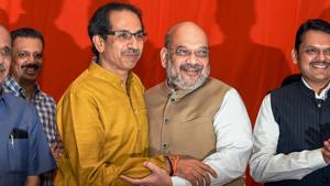 Mumbai: BJP President Amit Shah hugs Shiv Sena President Uddhav Thackeray after announcement of an alliance between Shiv Sena and BJP for Lok Sabha and Assembly polls, in Mumbai, Monday, Feb 18, 2019. Also seen are Maharashtra Chief Minister Devendra Fadnavis and former state chief minister Manohar Joshi. (PTI Photo/Shirish Shete) (PTI2_18_2019_000227B)(PTI) Mumbai: BJP President Amit Shah hugs Shiv Sena President Uddhav Thackeray after announcement of an alliance between Shiv Sena and BJP for Lok Sabha and Assembly polls, in Mumbai, Monday, Feb 18, 2019. Also seen are Maharashtra Chief Minister Devendra Fadnavis and former state chief minister Manohar Joshi. (PTI Photo/Shirish Shete) (PTI2_18_2019_000227B)(PTI)