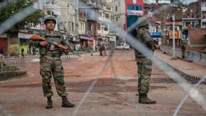 Army personnel stand guard at Gujjar Nagar area during a curfew, imposed on the third day after the clash between two communities over the protest against the Pulwama terror attack.(PTI) Army personnel stand guard at Gujjar Nagar area during a curfew, imposed on the third day after the clash between two communities over the protest against the Pulwama terror attack.(PTI)