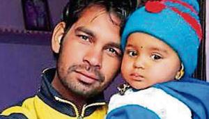 Naik Hari Singh with his son at his village. Singh was among the four soldiers killed in an encounter with militants in J-K’s Pulwama on Monday, Feb 18, 2019.(Sourced) Naik Hari Singh with his son at his village. Singh was among the four soldiers killed in an encounter with militants in J-K’s Pulwama on Monday, Feb 18, 2019.(Sourced)