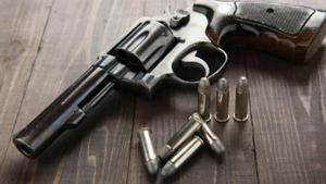 The arrested accused has been identified as Nanhe and a bag with Rs 19.65 lakh was seized from him, police said. Another packet was recovered from him which had a pistol, two country-made guns and some ammunition.(Picture for representation) The arrested accused has been identified as Nanhe and a bag with Rs 19.65 lakh was seized from him, police said. Another packet was recovered from him which had a pistol, two country-made guns and some ammunition.(Picture for representation)