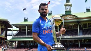 Virat Kohli poses with the ICC Cricket World Cup trophy at the Sydney Cricket Ground in Sydney on January 11.(AFP) Virat Kohli poses with the ICC Cricket World Cup trophy at the Sydney Cricket Ground in Sydney on January 11.(AFP)