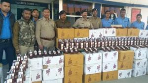 Over 25,000 litre of illicit liquor was seized from a godown in Greater Noida on Saturday and 10 people were arrested by the Gautam Buddh Nagar police.(ANI)