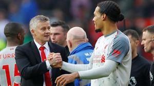 Manchester United interim manager Ole Gunnar Solskjaer shakes hands with Liverpool's Virgil van Dijk.(REUTERS) Manchester United interim manager Ole Gunnar Solskjaer shakes hands with Liverpool's Virgil van Dijk.(REUTERS)