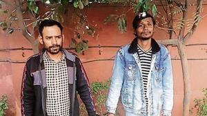 Arbaz Khan (left) and Noor Mohammad in police custody.(Handout) Arbaz Khan (left) and Noor Mohammad in police custody.(Handout)