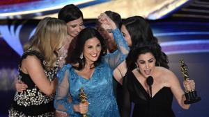 Melissa Berton (centre left) and Rayka Zehtabchi accept the award for best documentary short for Period. End of Sentence. at the Oscars on February 24, 2019 in Los Angeles.(Chris Pizzello/Invision/AP) Melissa Berton (centre left) and Rayka Zehtabchi accept the award for best documentary short for Period. End of Sentence. at the Oscars on February 24, 2019 in Los Angeles.(Chris Pizzello/Invision/AP)