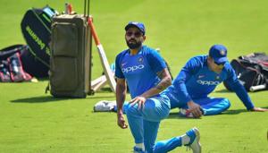 Indian cricket team captain Virat Kohli and M S Dhoni stretch during a practice session ahead of the 2nd T20 match against Australia, at Chinnaswamy Stadium in Bengaluru, Tuesday, Feb 26, 2019(PTI) Indian cricket team captain Virat Kohli and M S Dhoni stretch during a practice session ahead of the 2nd T20 match against Australia, at Chinnaswamy Stadium in Bengaluru, Tuesday, Feb 26, 2019(PTI)