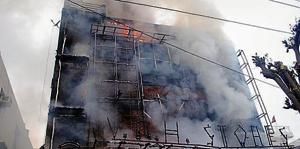 At least 10 fire tenders were rushed to the spot to douse the flames which began around 8 am. Officials of the district fire department said that they will soon initiate a drive against buildings which do not have no objection certificates (NoC) for fire.(Sakib Ali/HT Photo)