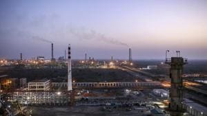 Emissions rise from chimneys at the Vadinar Refinery complex operated by Nayare Energy Ltd., formerly known as Essar Oil Ltd. and now jointly owned by Rosneft Oil Co. and Trafigura Group Pte., at dusk near Vadinar, Gujarat.(Bloomberg via Getty Images) Emissions rise from chimneys at the Vadinar Refinery complex operated by Nayare Energy Ltd., formerly known as Essar Oil Ltd. and now jointly owned by Rosneft Oil Co. and Trafigura Group Pte., at dusk near Vadinar, Gujarat.(Bloomberg via Getty Images)