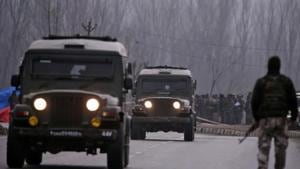 Soldiers stand guard near the site of suicide bomb attack in Lethpora in south Kashmir's Pulwama district.(REUTERS) Soldiers stand guard near the site of suicide bomb attack in Lethpora in south Kashmir's Pulwama district.(REUTERS)